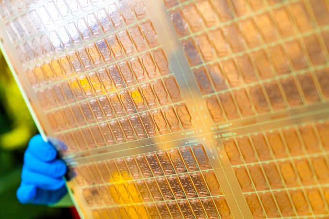 An Intel engineer holds a test glass core substrate panel at Intel's Assembly and Test Technology Development factories in Chandler, Arizona, in July 2023. Intel’s advanced packaging technologies come to life at the company's Assembly and Test Technology Development factories. (Credit: Intel Corporation)