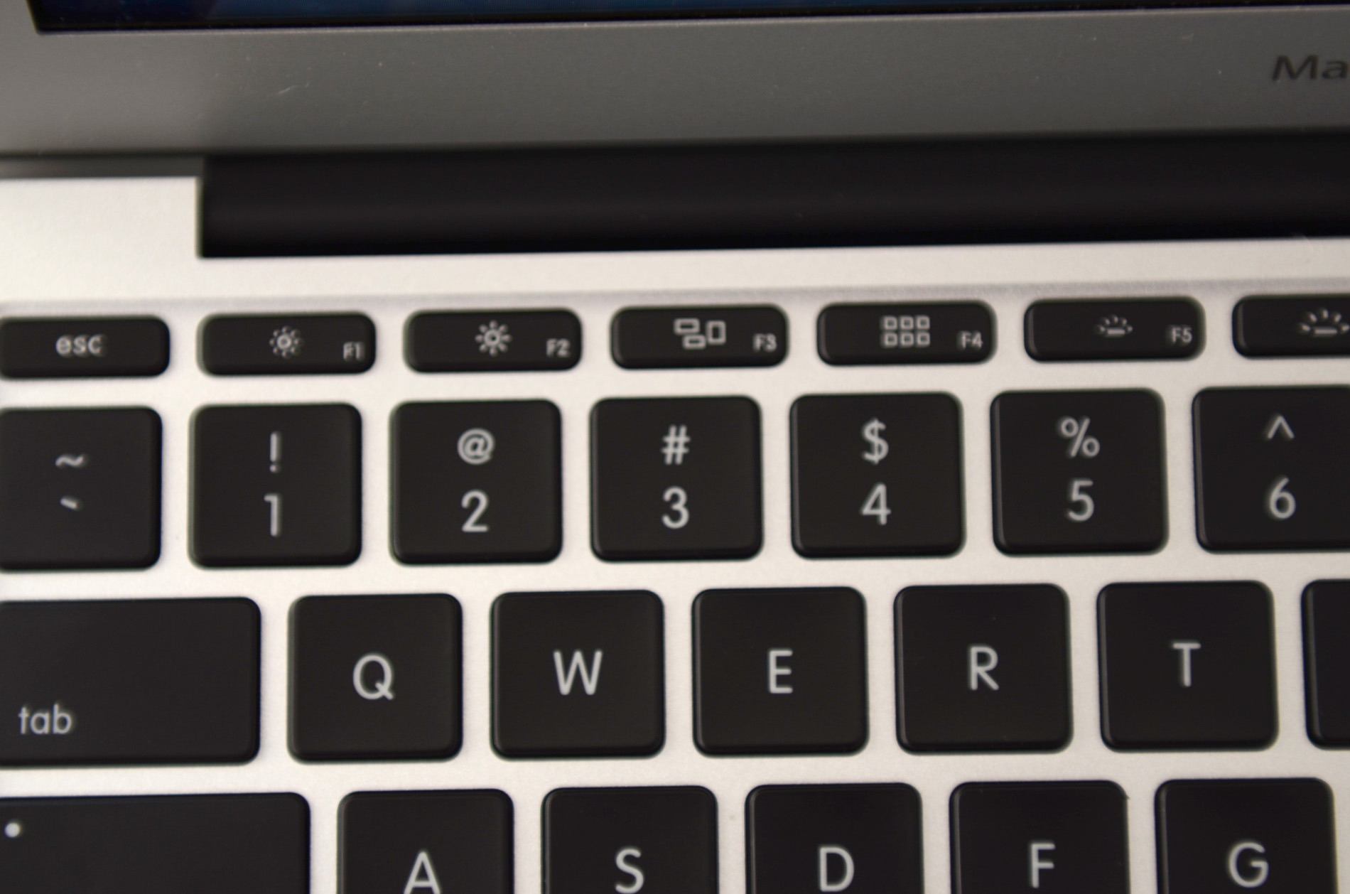 apple laptop with backlit keyboard